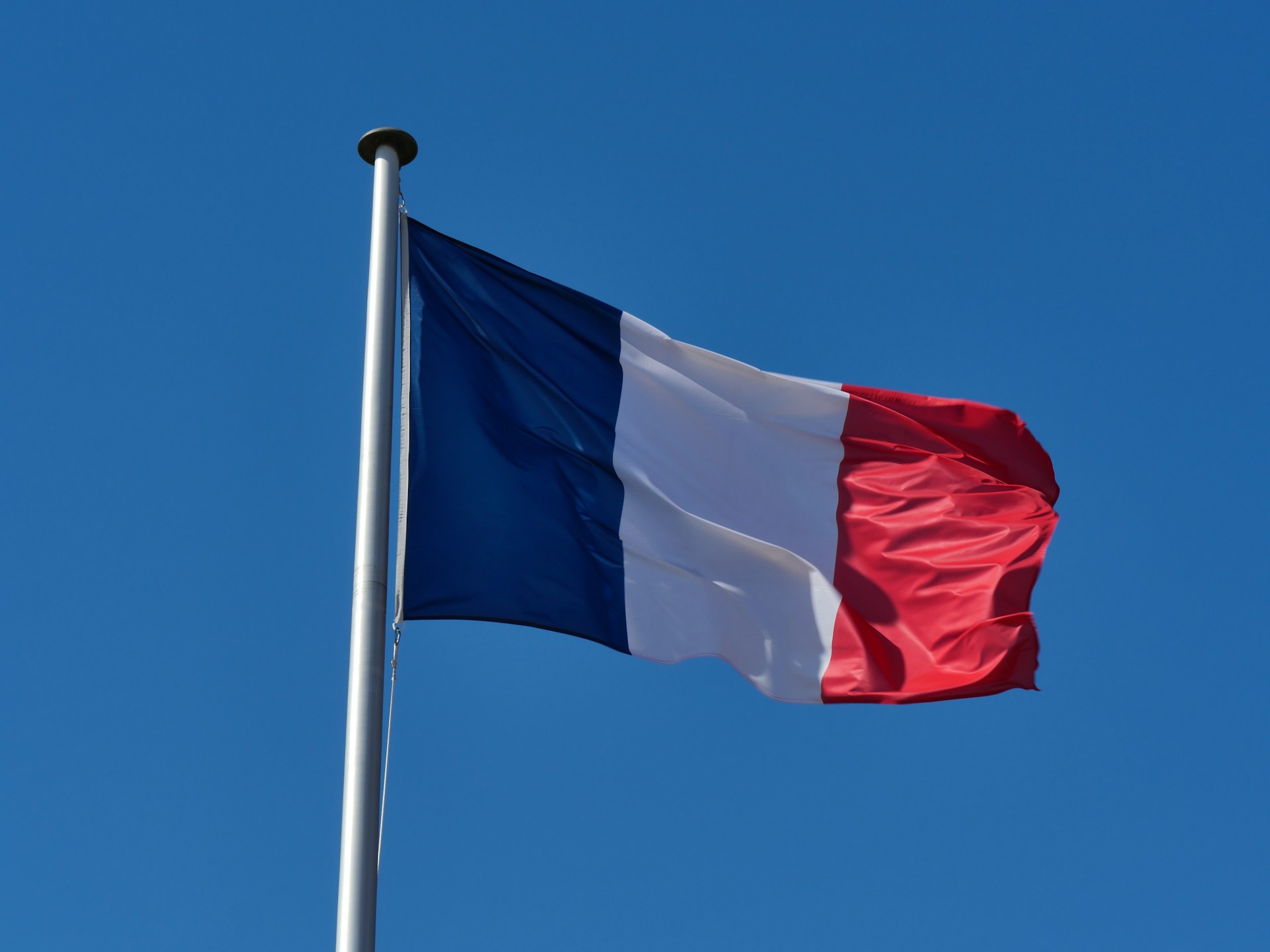 Réunion conseil municipal drapeau français